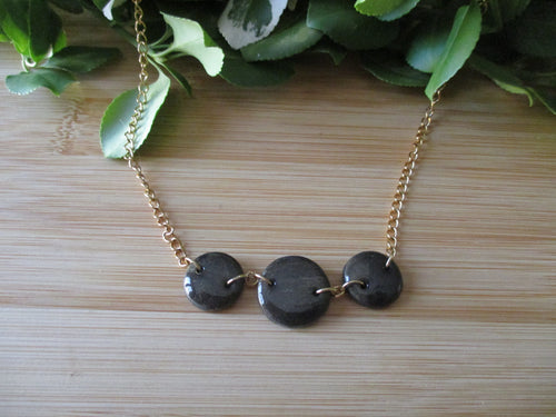 Collier Eclipse en pâte polymère et acier inoxydable 304. Fait main.